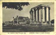 Black and white photo of the Temple of Jupiter Olympius ruins in Athens, Greece, with several tall columns standing and a partially collapsed structure in the background.