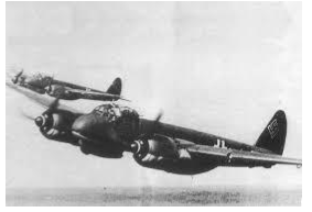 Black and white photo of a Second World War-era German military aeroplane in flight, showing two engines and a swastika insignia on the tail.
