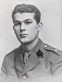 Black-and-white portrait of a young man in a military uniform, facing forwards with a neutral expression.