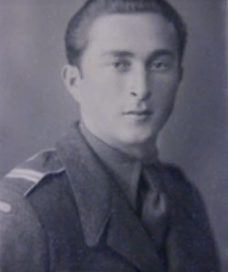 Black and white portrait of a young man in military uniform, facing the camera with a neutral expression.