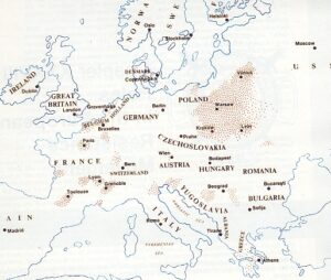 A map of Europe showing countries, major cities, and an area of brown dots concentrated across Poland, Germany, Czechoslovakia, Austria, Hungary, and surrounding regions.