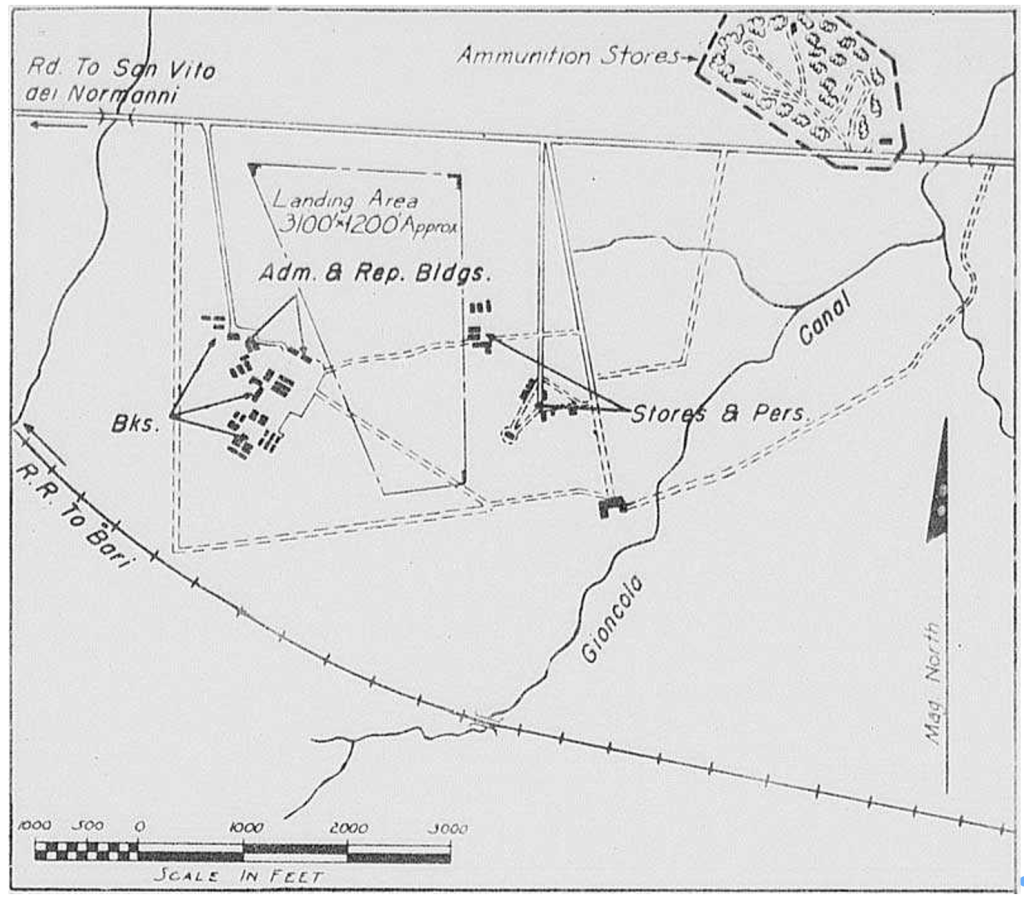 Black and white map showing a military area with labelled locations: landing area, buildings, canal, road, ammunition stores, and scale in feet. North indicated by an arrow.