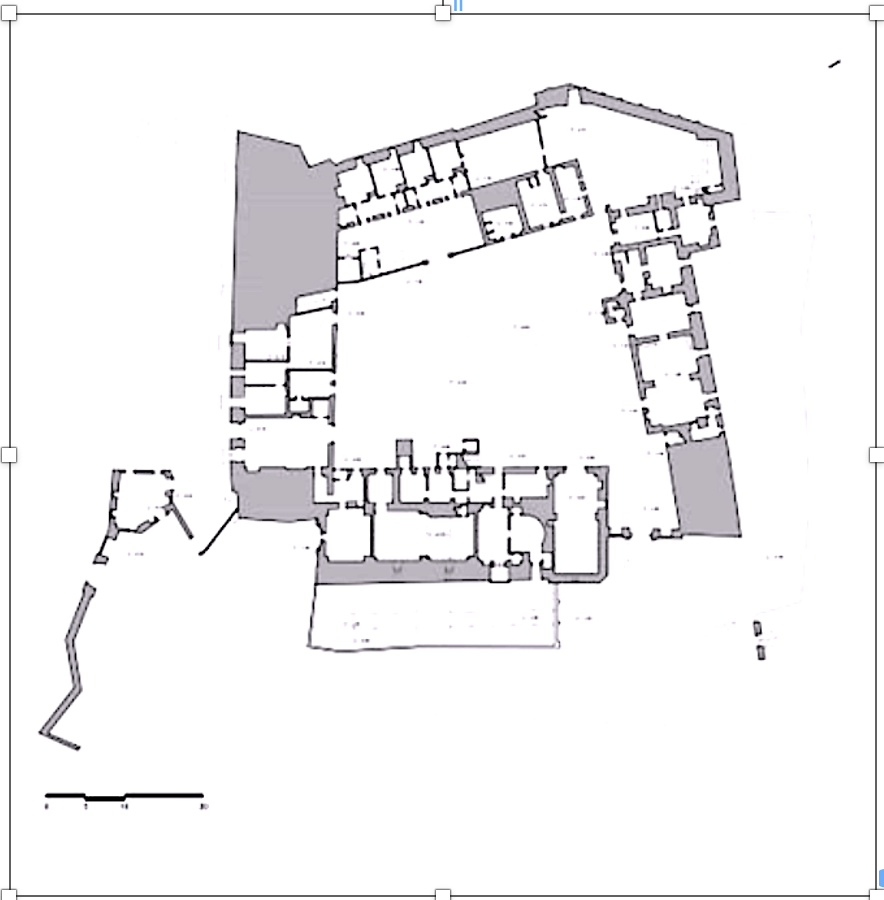 Black and white architectural floor plan showing multiple rooms and corridors in an irregularly shaped building layout.